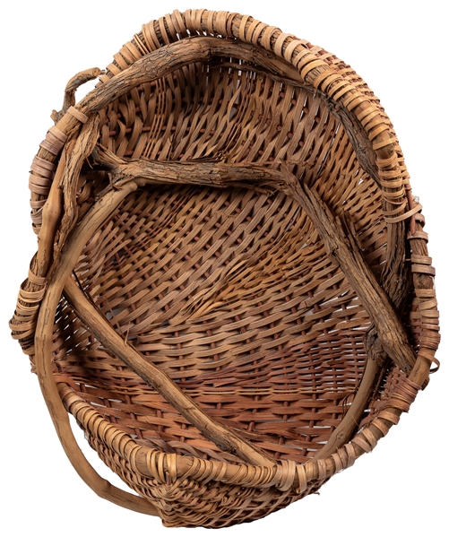  [AMERICAN CRAFT]. Freeform Harvest Basket. Natural material...