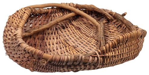  [AMERICAN CRAFT]. Freeform Harvest Basket. Natural material...