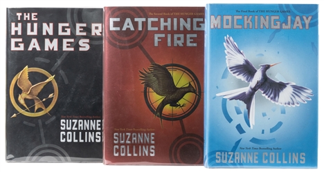  COLLINS, Suzanne (b. 1962). The Hunger Games Trilogy, inclu...