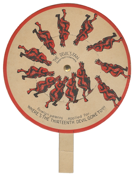 The Devils Fan. Circa 1900. Circular fan with moveable han...
