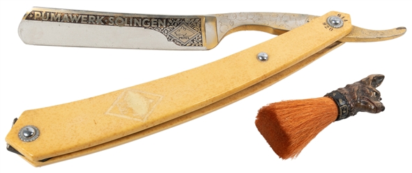  Two Shaving Items. Includes: an oversized Puma Pumawerk Sol...