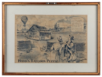  Two Framed Advertising Puzzles. Early 20th century. Pair of...