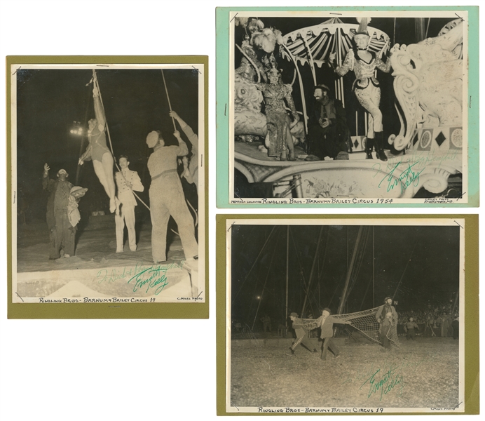  KELLY, Emmett. Eight photographs, three signed by Kelly. Ci...