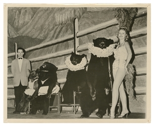  Eight Photographs and Postcards of Circus Bear Trainers. Ei...