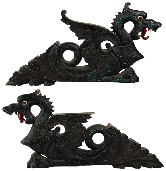 Pair of Carved Wooden Dragon Ornaments. Circa 20th century....