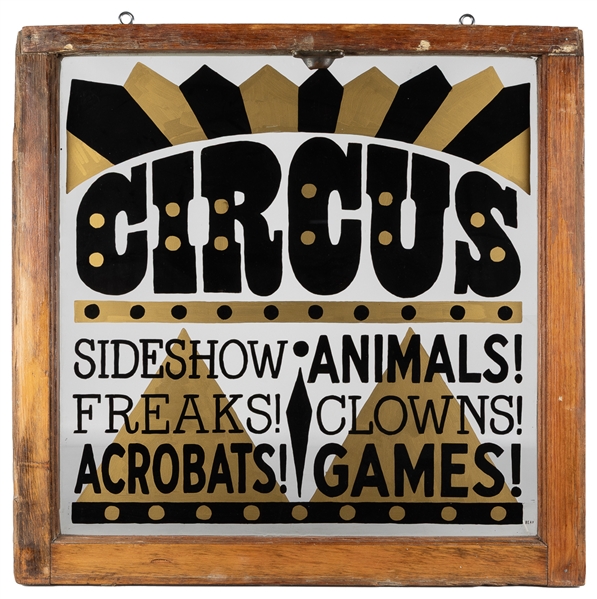  Circus Glass Window. In a wooden frame, lettered in black a...