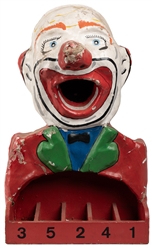  Carnival Clown Ball Toss Game. Circa mid-20th century. Papi...