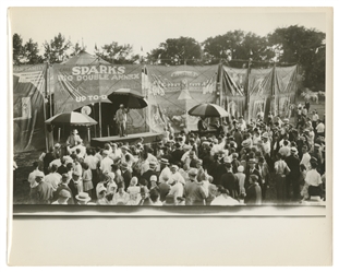  Three circus midway photographs. Circa 1930s. Includes view...