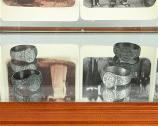  [GIANTS]. Glass Display Case of Circus Giant Souvenir Rings...