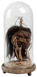  Shrunken Head Gaff Display. Circa 20th century. Gaff shrunk...