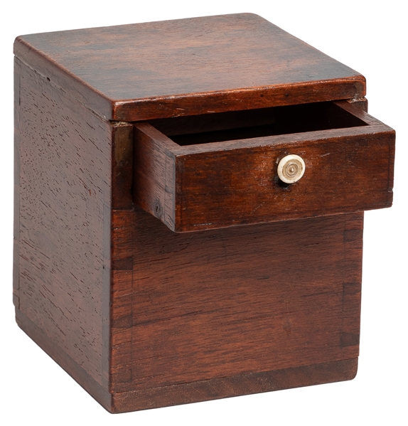  Davenport Cabinet. Circa 1875. A coin or small object inser...