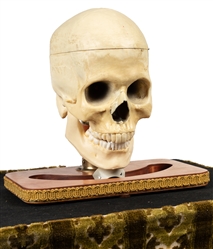  Electronic Talking Skull. Circa 1960. An imitation skull ra...