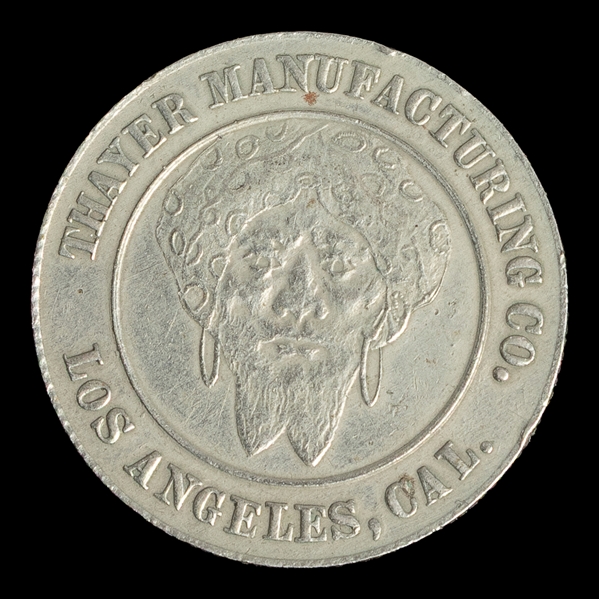  THAYER, Floyd (1877 – 1959). Thayer Manufacturing Co. Token...