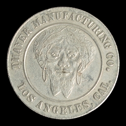  THAYER, Floyd (1877 – 1959). Thayer Manufacturing Co. Token...