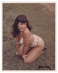  Bettie Page Signed Photograph. Color 8 x 10" photo on Kodak...