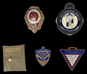  Four miscellaneous badges. Including: a Roxy Theatre 1939 b...