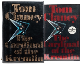  CLANCY, Tom (1947-2013). Two Signed Copies of The Cardinal ...